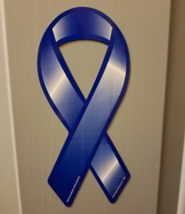 Blue Ribbon Magnet on White Metal Door