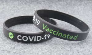 Charcoal Gray Covid-19 Vaccinated Wristband with White & Green Lettering